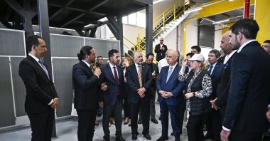 Executives and officials tour the production facility for a domestically developed nanotechnology product that can reduce water consumption in agriculture, Istanbul, Türkiye, May 17, 2026. (AA Photo)