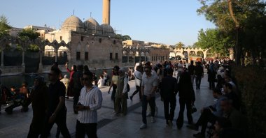 People walk in the Şanlıurfa province, southeastern Türkiye, May 10, 2026. (AA Photo)