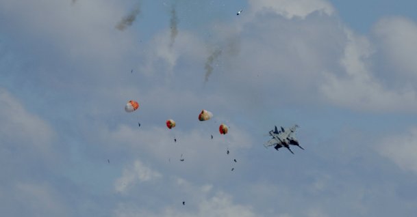 Four crew members of military jets eject safely following a mid-air collision during the Idaho air show outside Mountain Home Air Force Base in Idaho, U.S. May 17, 2026. (Henk Zuurbier/Handout via Reuters)