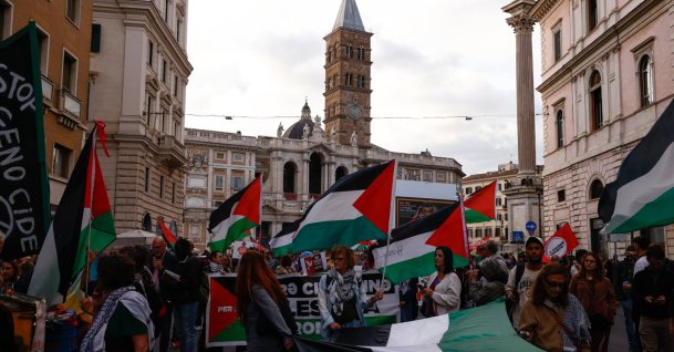 Protesters wave Palestinian flags and hold signs supporting the Global Sumud Flotilla during a march in Rome, Italy, May 18, 2026. (AA Photo)