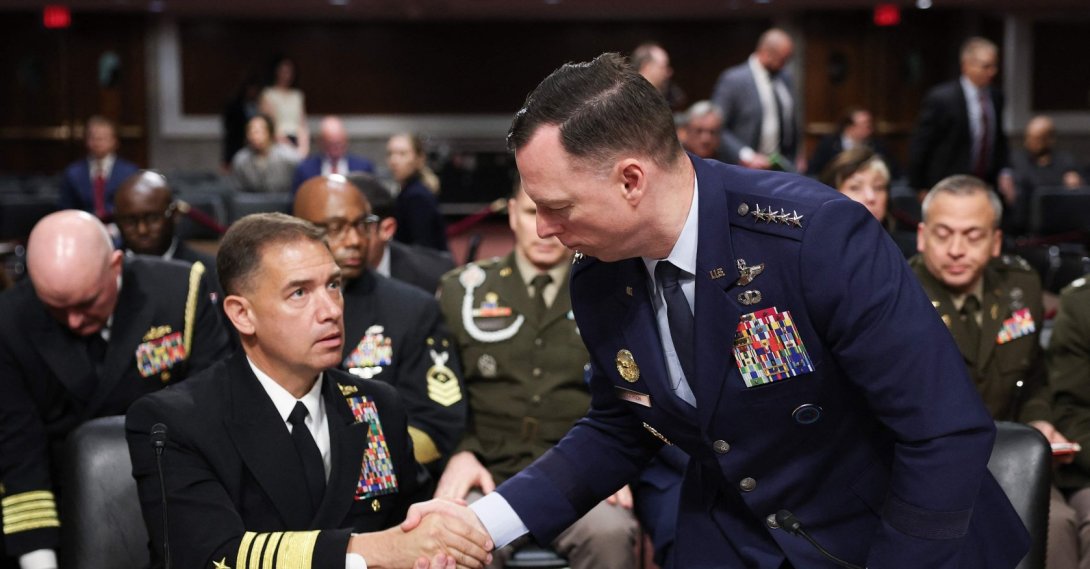 Commander of U.S. Africa Command (AFRICOM) Air Force Gen. Dagvin Anderson (R) shakes hands with Commander of U.S. Central Command (CENTCOM) Navy Adm. Brad Cooper (L) as they conclude their testimony before the Senate Armed Services Committee in the Dirksen Senate Office Building on Capitol Hill, Washington, U.S., May 14, 2026. (AFP Photo)