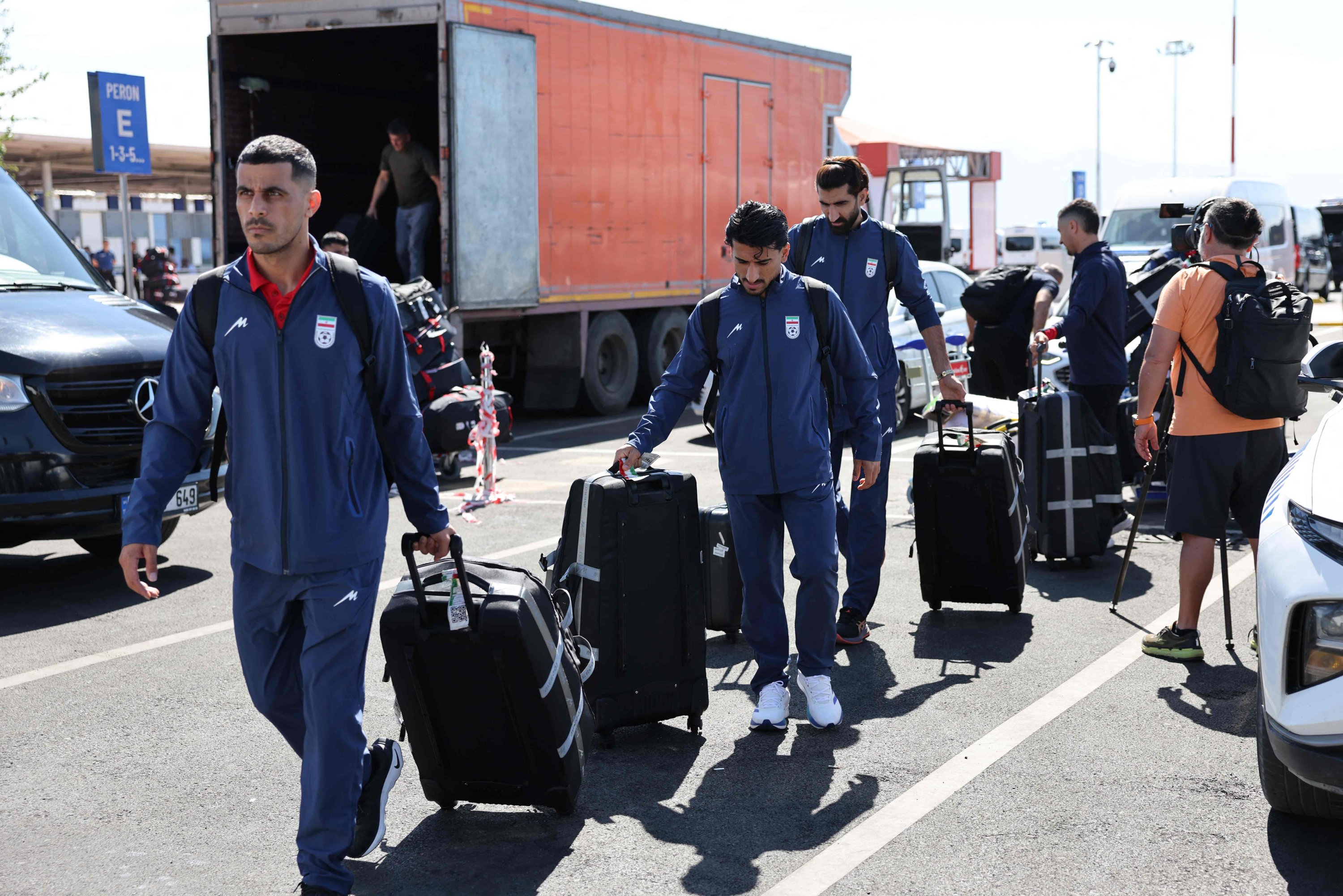 Members of the Iranian national football team exit a terminal following their arrival in Türkiye ahead of their trip to the U.S. for the FIFA World Cup 2026, at Antalya airport, Antalya, Türkiye, May 18, 2026. (AFP Photo)