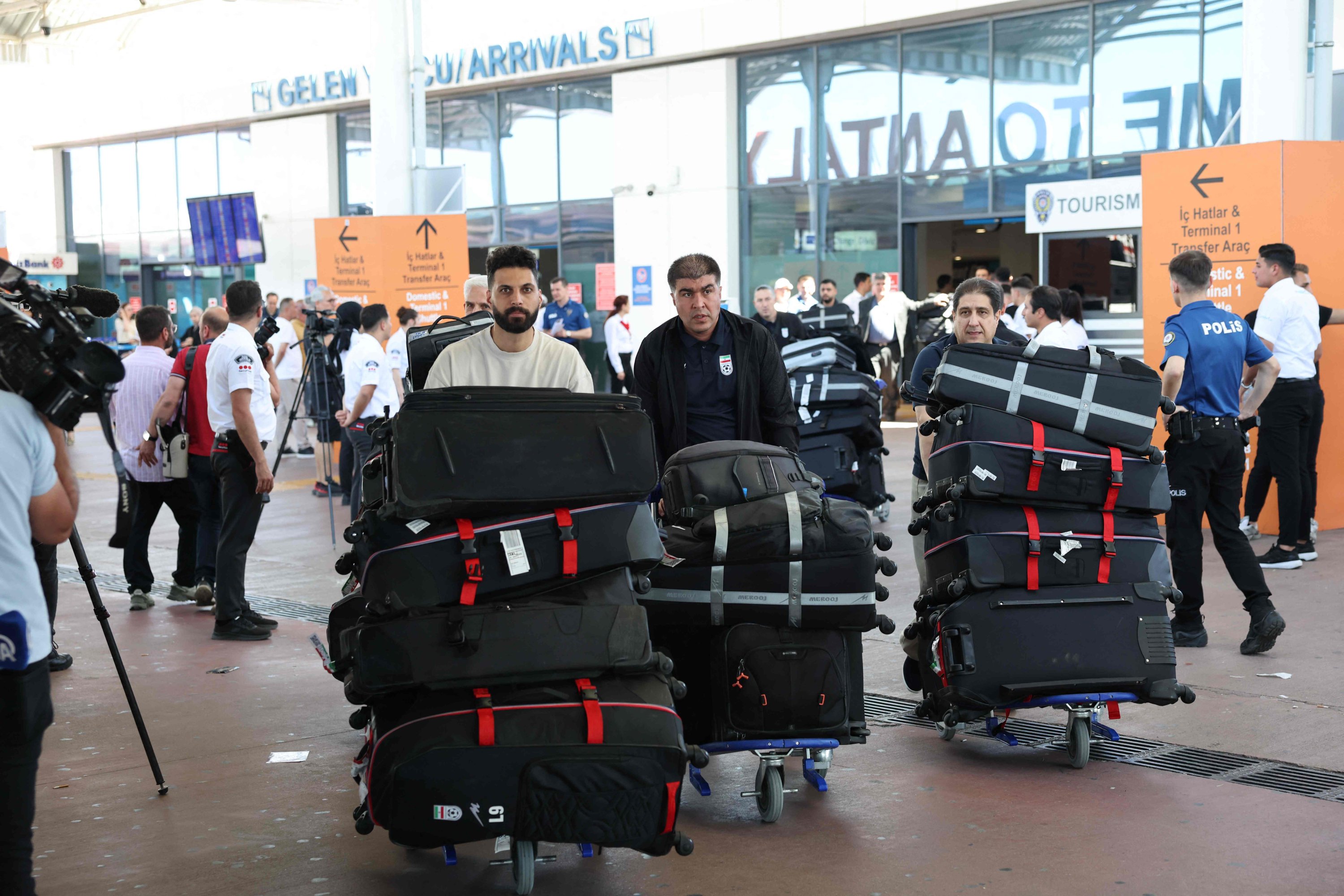 Members of the Iranian national football team exit a terminal following their arrival in Türkiye ahead of their trip to the U.S. for the FIFA World Cup 2026, at Antalya airport, Antalya, Türkiye, May 18, 2026. (AFP Photo)