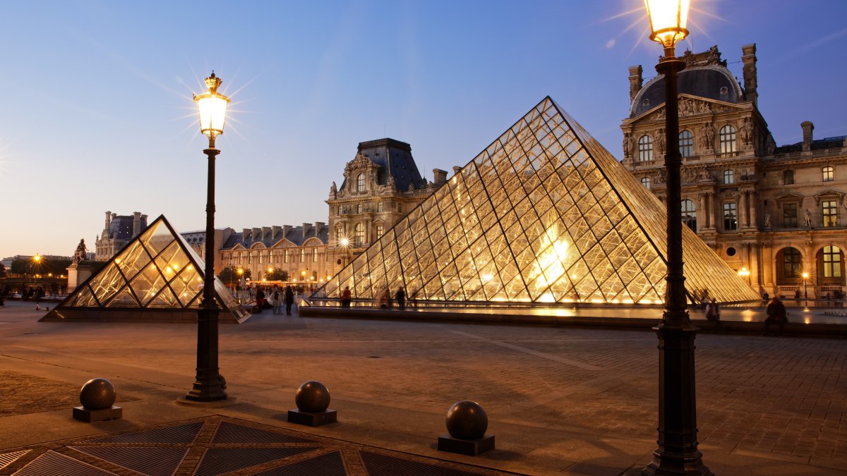The Louvre Museum pyramid is seen at blue hour in Paris, France, Oct. 21, 2018. (Shutterstock Photo)