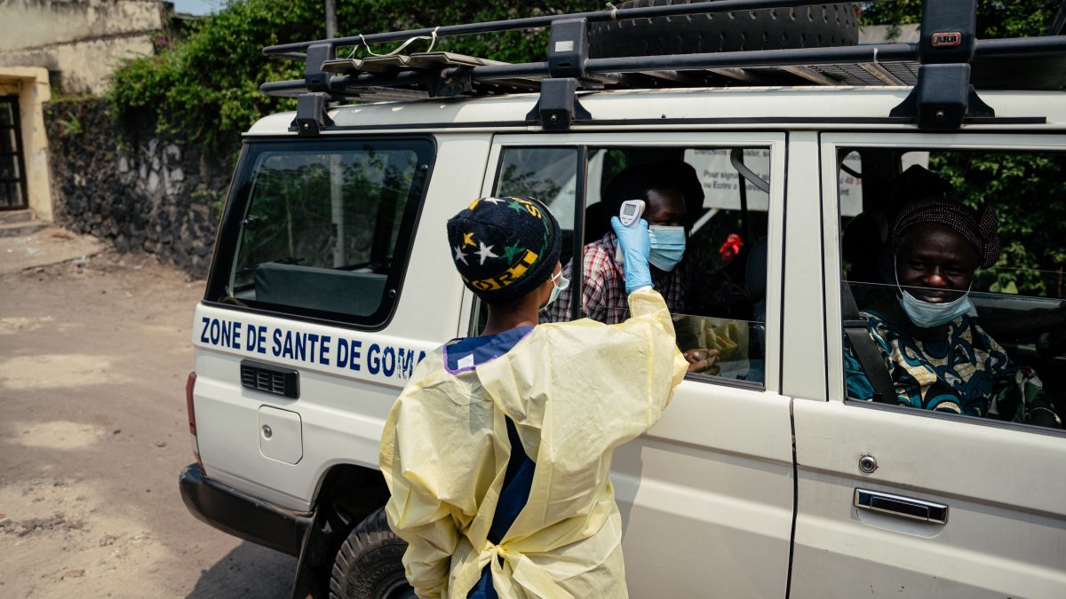 A visitor has their temperature checked by a health worker using a thermoflash before entering Kyeshero Hospital at a checkpoint in Goma, Democratic Republic of Congo, on May 18, 2026. (AFP Photo)