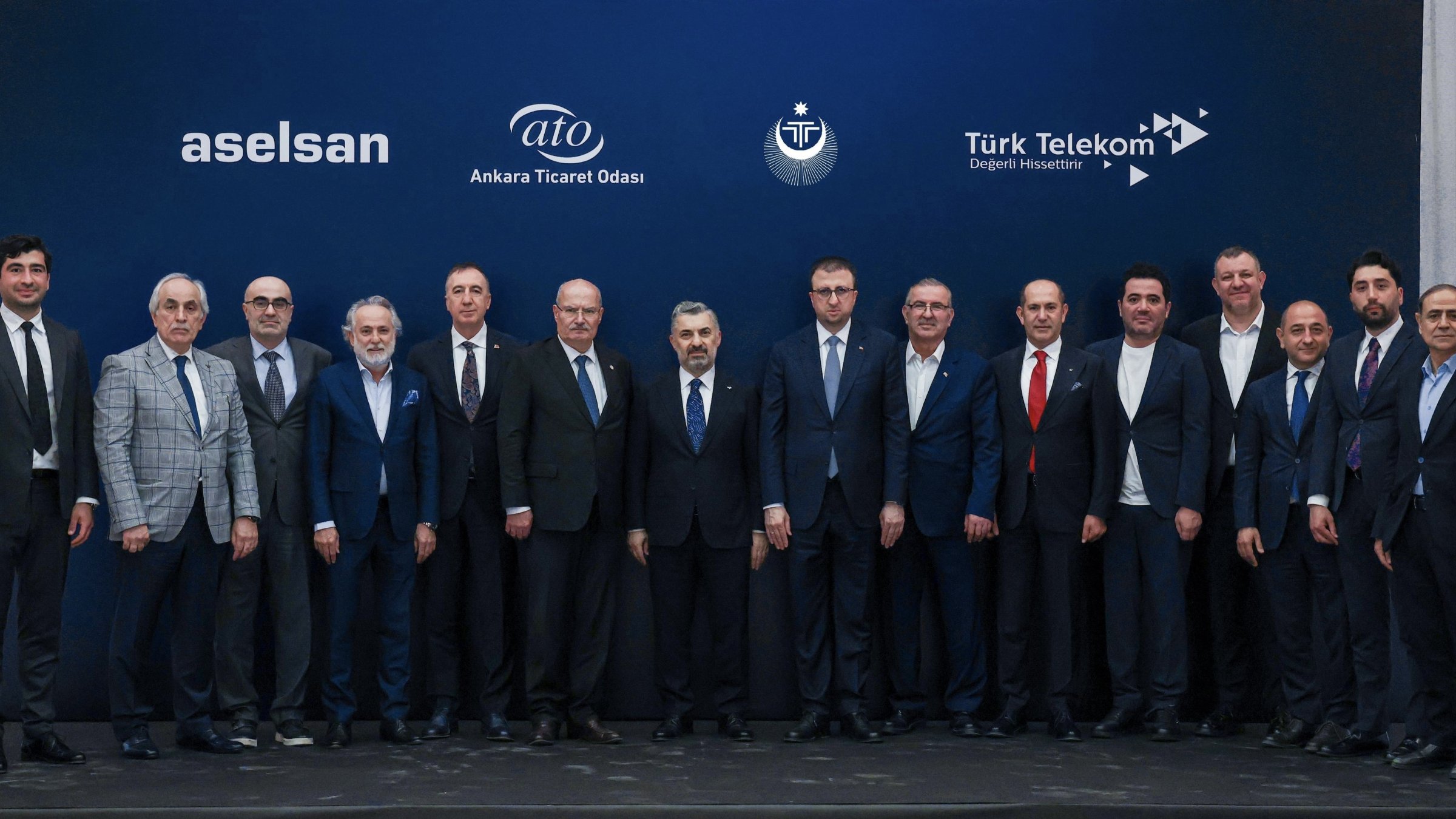 Türk Telekom CEO Ebubekir Şahin (8th L), Aselsan CEO Ahmet Akyol (9th R) and other officials attend a launch event, Istanbul, Türkiye, May 18, 2026. (IHA Photo)
