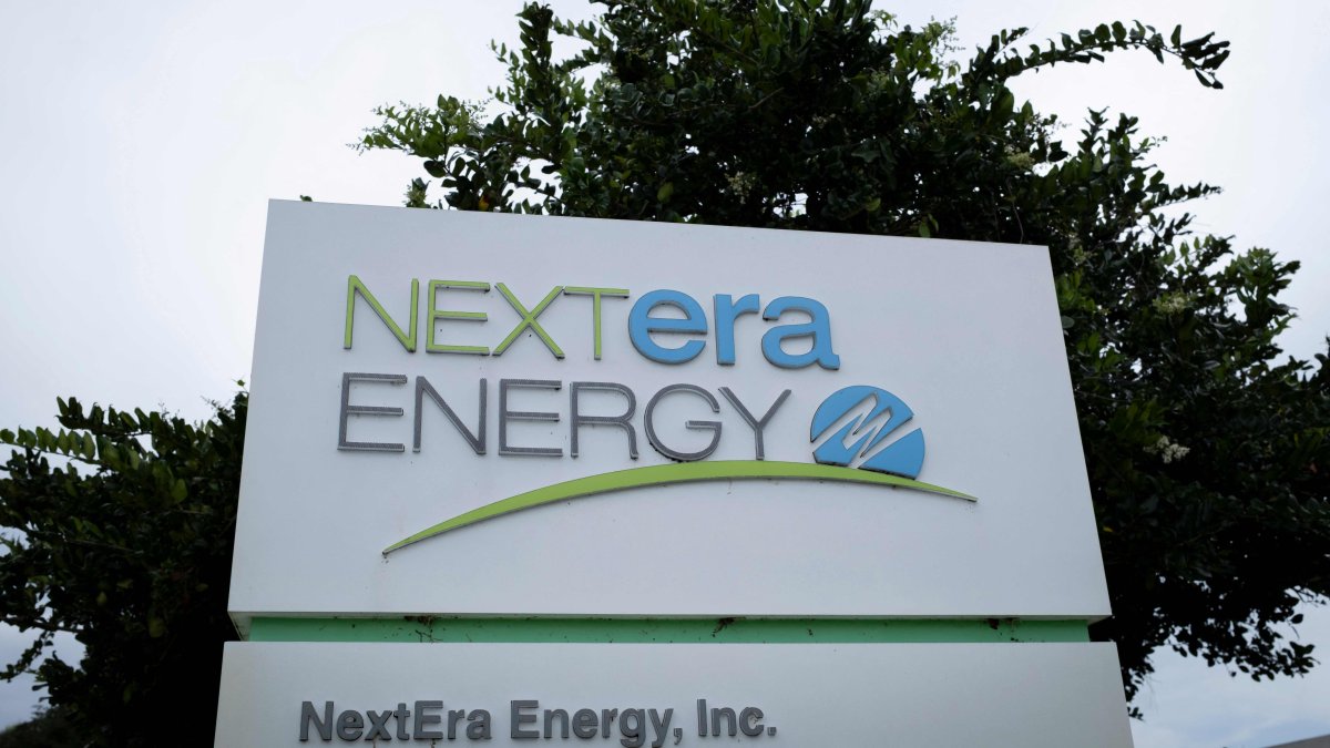 The logo of NextEra Energy is seen at the entrance of its headquarters in Juno Beach, Florida, U.S., May 18, 2026. (AFP Photo) 