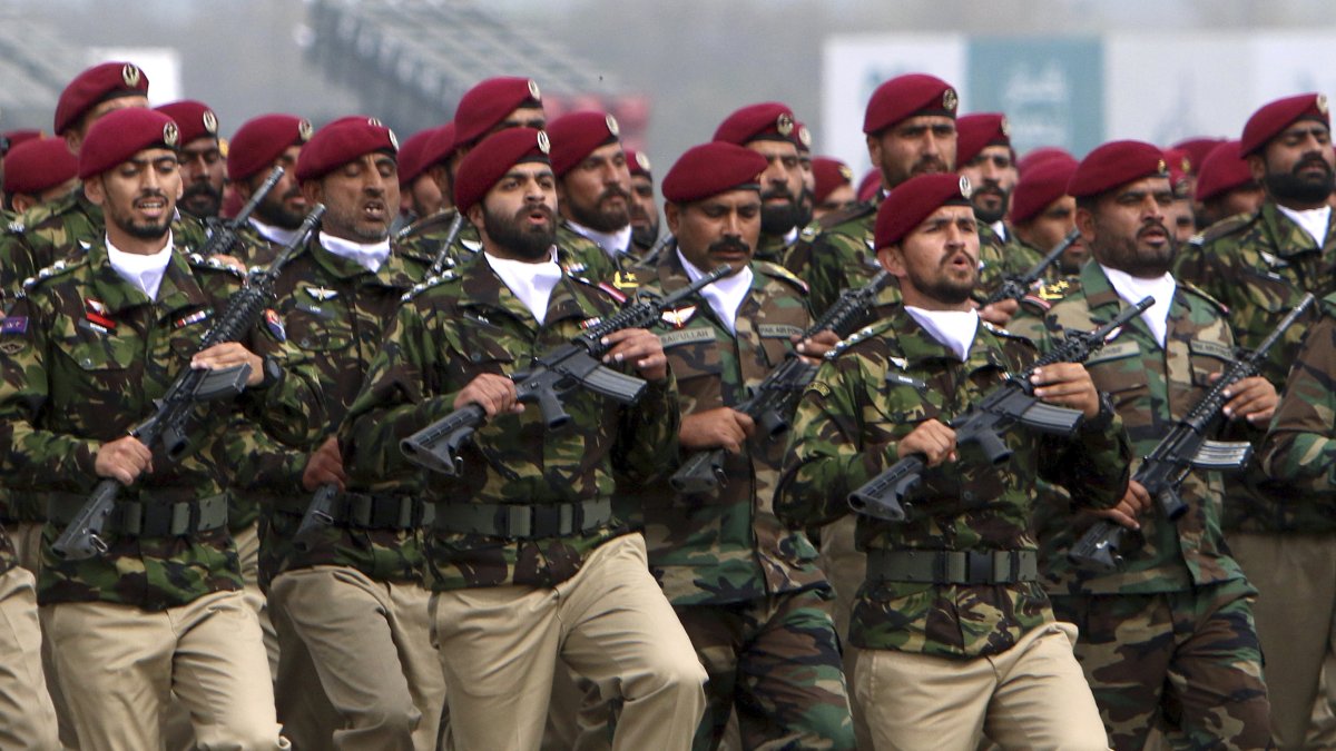 Pakistani commandos from the Special Services Group march during a military parade to mark Pakistan National Day in Islamabad, Pakistan, March 23, 2024. (AP Photo)