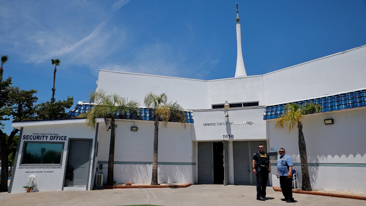 A police officer stands outside the Islamic Center of San Diego, the day after a fatal shooting incident, in San Diego, California, U.S, May 19, 2026. (Reuters Photo)