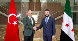 National Intelligence Organization (MIT) head Ibrahim Kalın (L) and Syria's President Ahmed al-Sharaa shake hands as part of their meeting, Damascus, Syria, Jan. 26, 2025. (AA File Photo)