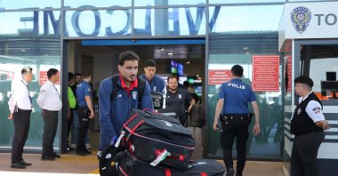 Members of the Iranian national football team exit a terminal following their arrival in Türkiye ahead of their trip to the U.S. for the FIFA World Cup 2026, at Antalya airport, Antalya, Türkiye, May 18, 2026. (AA Photo)