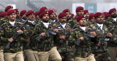 Pakistani commandos from the Special Services Group march during a military parade to mark Pakistan National Day in Islamabad, Pakistan, March 23, 2024. (AP Photo)