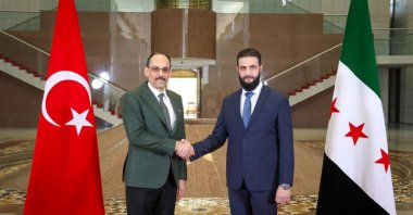 National Intelligence Organization (MIT) head Ibrahim Kalın (L) and Syria's President Ahmed al-Sharaa shake hands as part of their meeting, Damascus, Syria, Jan. 26, 2025. (AA File Photo)