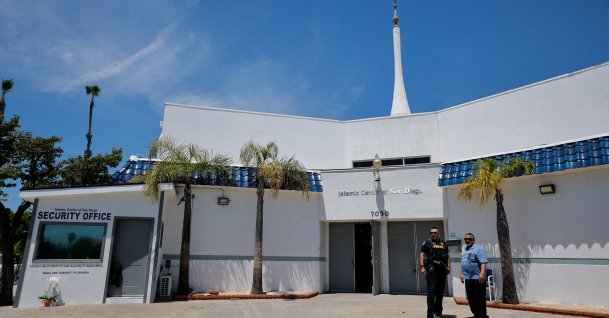 A police officer stands outside the Islamic Center of San Diego, the day after a fatal shooting incident, in San Diego, California, U.S, May 19, 2026. (Reuters Photo)