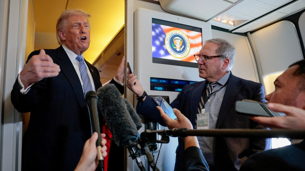U.S. President Donald Trump speaks to the press aboard Air Force One en route to the U.S. following his official visit with Chinese President Xi Jinping, Beijing, China, May 15, 2026. (Reuters Photo)