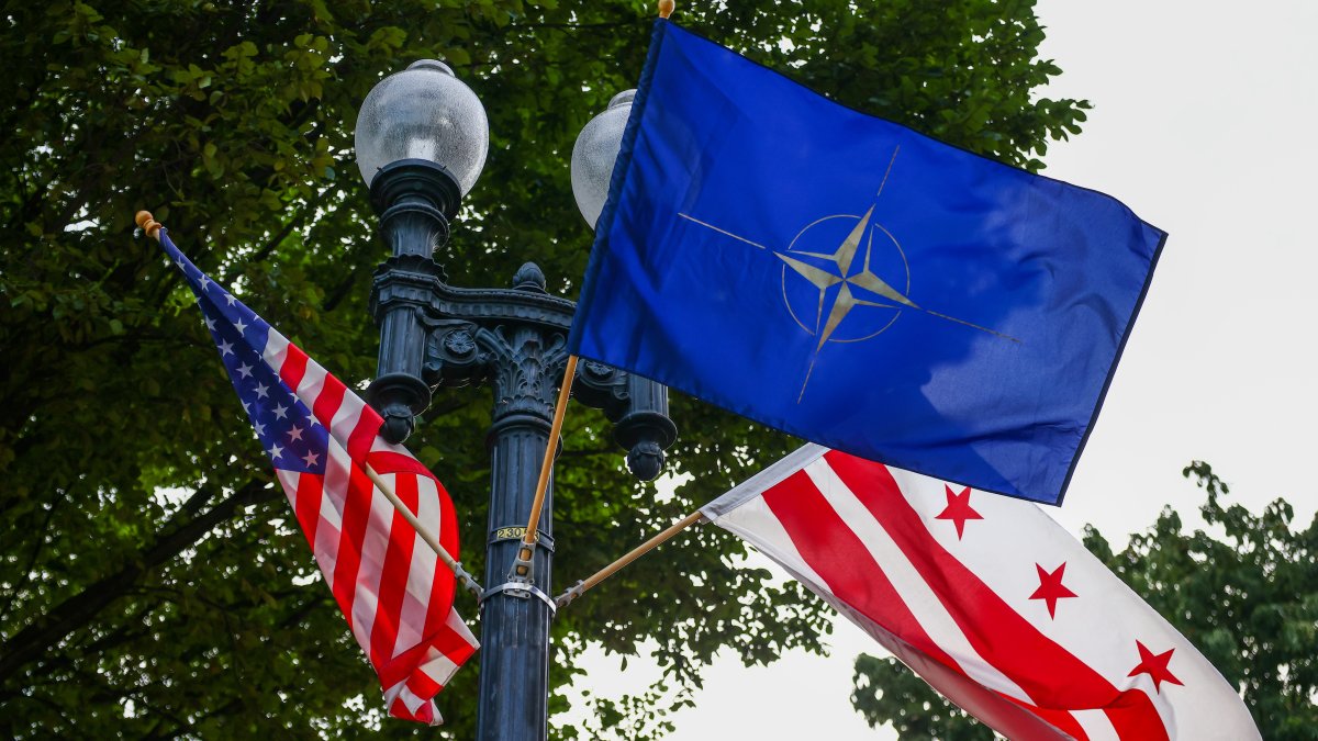 The flags of NATO, the U.S. and Washington D.C. are seen during the 75th NATO Summit in Washington, DC, U.S., July 9, 2025. (Getty Images Photo)