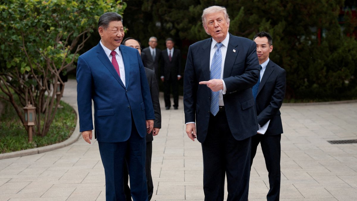U.S. President Donald Trump gestures towards Chinese President Xi Jinping while leaving after a visit to the Zhongnanhai Garden in Beijing, China, May 15, 2026. (Reuters Photo)