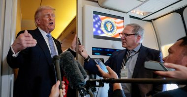U.S. President Donald Trump speaks to the press aboard Air Force One en route to the U.S. following his official visit with Chinese President Xi Jinping, Beijing, China, May 15, 2026. (Reuters Photo)