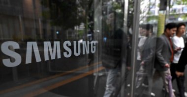 The logo of Samsung Electronics is displayed on a glass door at the company's Seocho building in Seoul, South Korea, May 20, 2026. (AFP Photo)