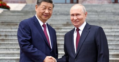 Russian President Vladimir Putin shakes hands with Chinese President Xi Jinping during a welcoming ceremony at the Great Hall of the People in Beijing, China, May 20, 2026. (Reuters Photo)