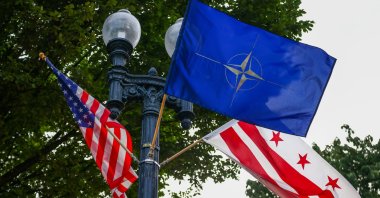 The flags of NATO, the U.S. and Washington D.C. are seen during the 75th NATO Summit in Washington, DC, U.S., July 9, 2025. (Getty Images Photo)