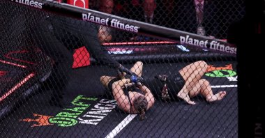 Ronda Rousey (C) pins Gina Carano to win their fight in their featherweight bout during the main card fights of Netflix's Ronda Rousey vs Gina Carano at Intuit Dome, Inglewood, U.S., May 16, 2026. (EPA Photo)