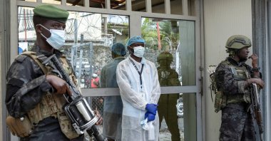 Members of the M23 rebel group guard the National Biomedical Research Institute (INRB), where samples from suspected Ebola cases are tested, in Goma, Democratic Republic of Congo, May 19, 2026. (Reuters Photo)