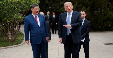 U.S. President Donald Trump gestures towards Chinese President Xi Jinping while leaving after a visit to the Zhongnanhai Garden in Beijing, China, May 15, 2026. (Reuters Photo)