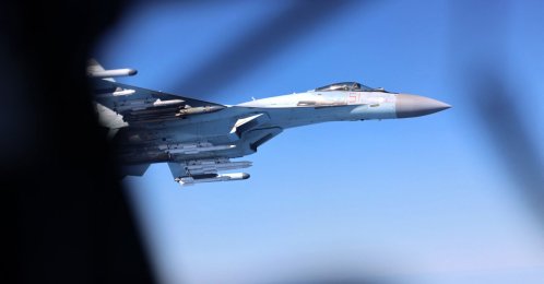A handout picture released by Britain's Ministry of Defence (MOD) in London on May 20, 2026 shows Image of a Russian Su-35, seen here alongside an RAF Rivet Joint aircraft over the Black Sea in April 2026. (AFP Photo)
