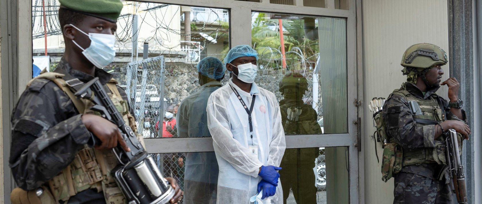 Members of the M23 rebel group guard the National Biomedical Research Institute (INRB), where samples from suspected Ebola cases are tested, in Goma, Democratic Republic of Congo, May 19, 2026. (Reuters Photo)