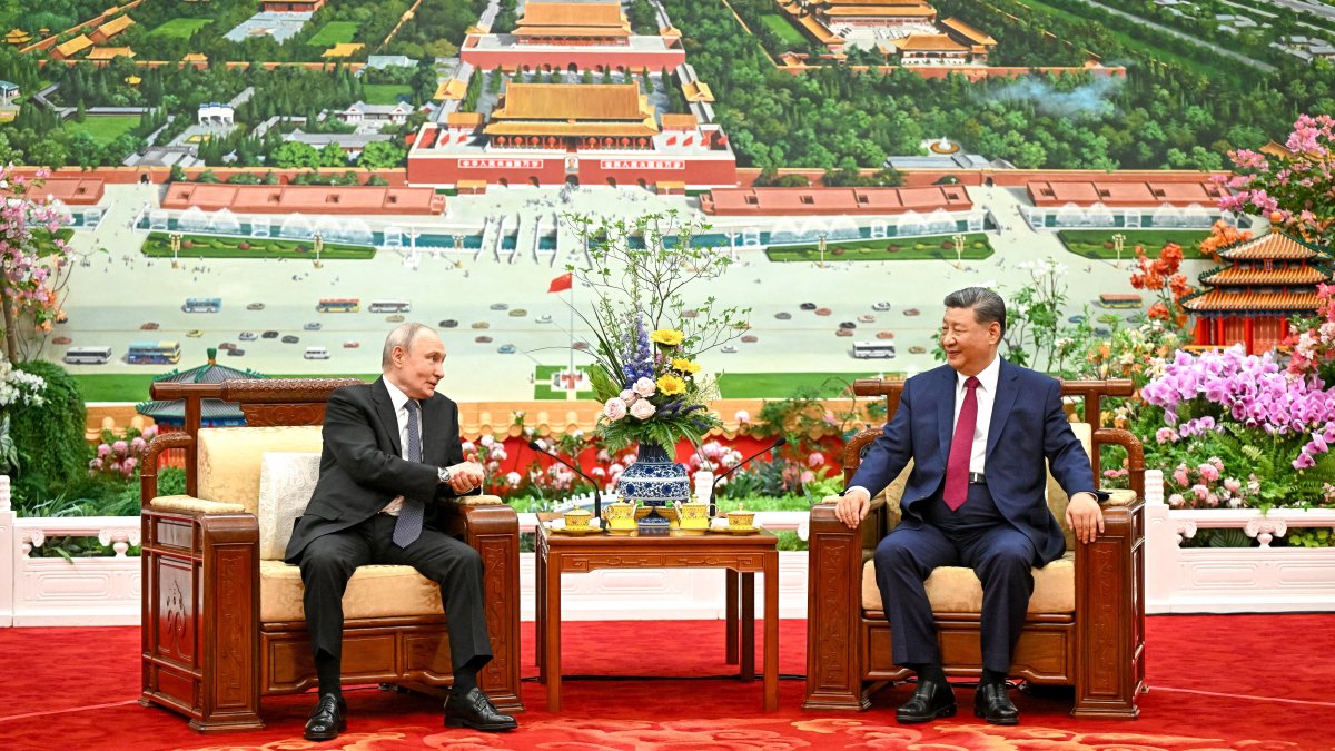 Russian President Vladimir Putin and Chinese President Xi Jinping have tea following their meeting at the Great Hall of the People, Beijing, China, May 20, 2026. (Reuters Photo)