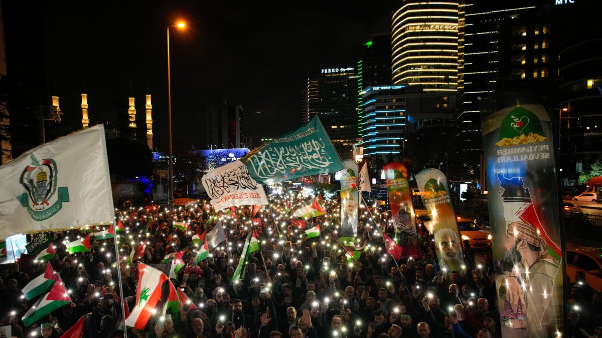 People gather in front of the Israeli Consulate during a protest against the interception of the Gaza-bound Sumud flotilla by Israeli navy forces, Istanbul, Türkiye, Oct. 2, 2025. (AP Photo)