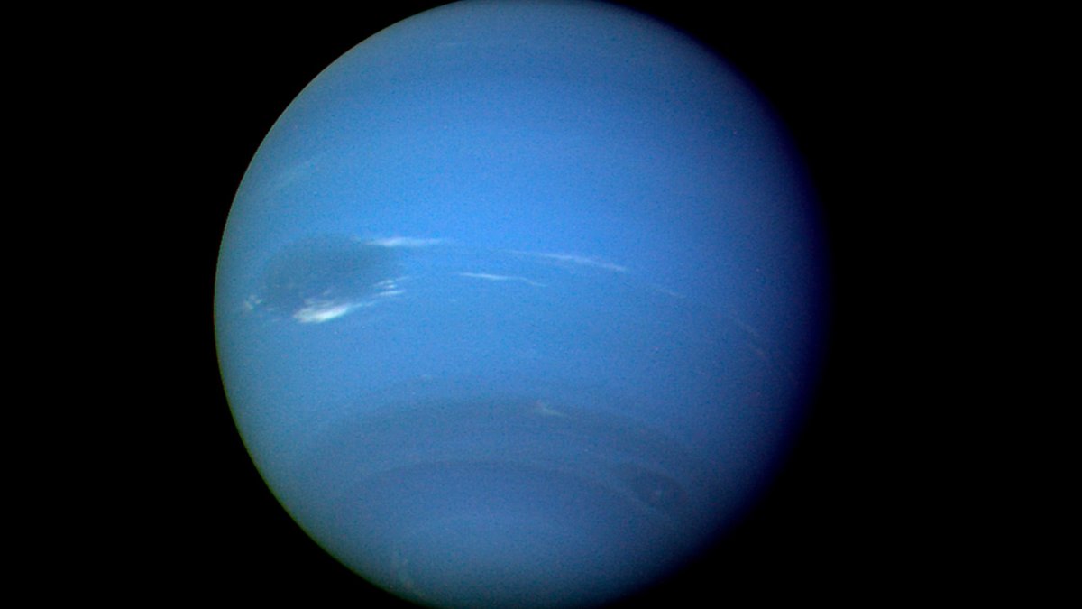 This image, provided by NASA, shows the planet Neptune photographed by the Voyager 2 spacecraft, processed to enhance the visibility of small features, August 1989. (AP Photo)