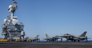Rafale fighter aircraft parked on the flight deck of the French aircraft carrier Charles de Gaulle during the NATO military exercise Neptune Strike 26-2, off the coast of the Greek island of Crete, April 27, 2026. (AFP Photo)