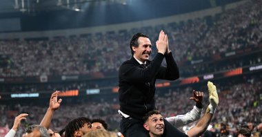 Aston Villa's manager Unai Emery celebrates with his players after winning the UEFA Europa League final football match between SC Freiburg and Aston Villa at Beşiktaş Park, Istanbul, Türkiye, May 20, 2026. (AFP Photo)