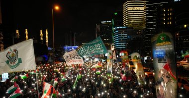 People gather in front of the Israeli Consulate during a protest against the interception of the Gaza-bound Sumud flotilla by Israeli navy forces, Istanbul, Türkiye, Oct. 2, 2025. (AP Photo)
