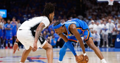 Oklahoma City Thunder's Shai Gilgeous-Alexander (R) looks to pass as San Antonio Spurs' Stephon Castle defends during the fourth quarter during game two of the Western Conference Finals for the 2026 NBA playoffs at Paycom Center, Oklahoma, U.S., May 20, 2026. (Reuters Photo)
