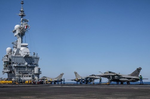 Rafale fighter aircraft parked on the flight deck of the French aircraft carrier Charles de Gaulle during the NATO military exercise Neptune Strike 26-2, off the coast of the Greek island of Crete, April 27, 2026. (AFP Photo)