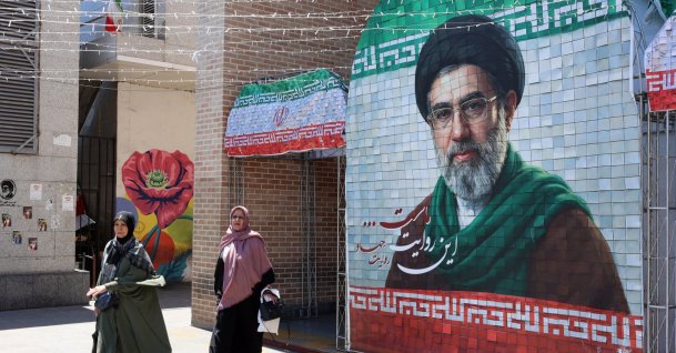 Iranians walk past a picture of Iranian Supreme Leader Ayatollah Mojtaba Khamenei in Tehran, Iran, May 18, 2026. (EPA Photo)