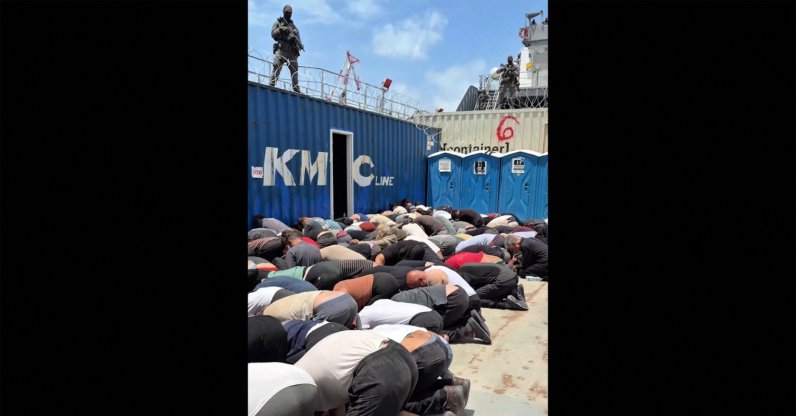 This screen grab taken from footage released on Israeli National Security Minister Itamar Ben Gvir’s X account shows dozens of detained activists from the Gaza-bound aid flotilla kneeling with their hands tied behind their backs and their foreheads on the ground on the deck of a military boat in Israel, May 20, 2026. (AFP Photo)