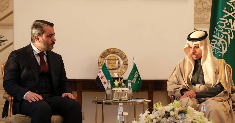 Syria's Foreign Minister Asaad al-Shaibani (L) meeting with his Saudi counterpart Faisal bin Farhan Al-Saud in Riyadh, Jan. 2, 2025. (Photo by SANA via AFP) 