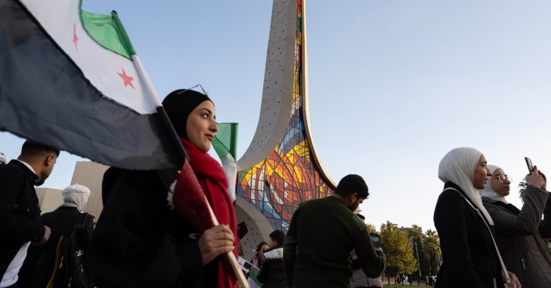 Syrians gather at the city center to celebrate one year since the fall of the Assad regime, Damascus, Syria, Dec. 7, 2025. (Getty Images Photo)