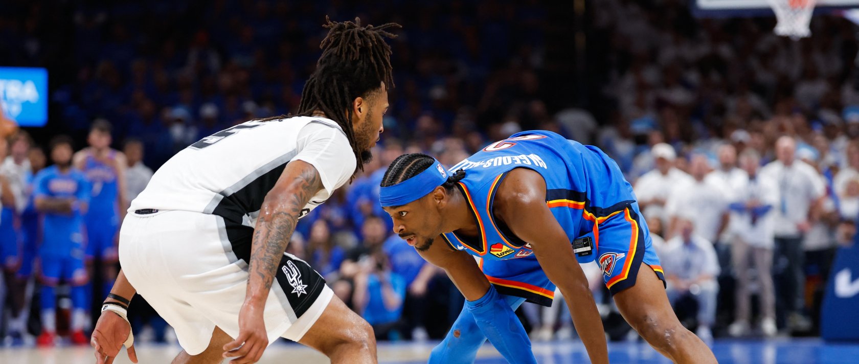 Oklahoma City Thunder's Shai Gilgeous-Alexander (R) looks to pass as San Antonio Spurs' Stephon Castle defends during the fourth quarter during game two of the Western Conference Finals for the 2026 NBA playoffs at Paycom Center, Oklahoma, U.S., May 20, 2026. (Reuters Photo)
