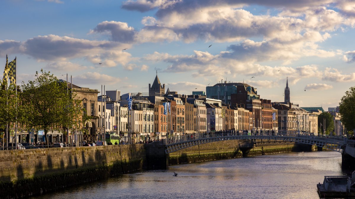 Pedestrians cross the Ha'penny Bridge over the River Liffey, Dublin, Ireland, June 8, 2024. (Shutterstock Photo)
