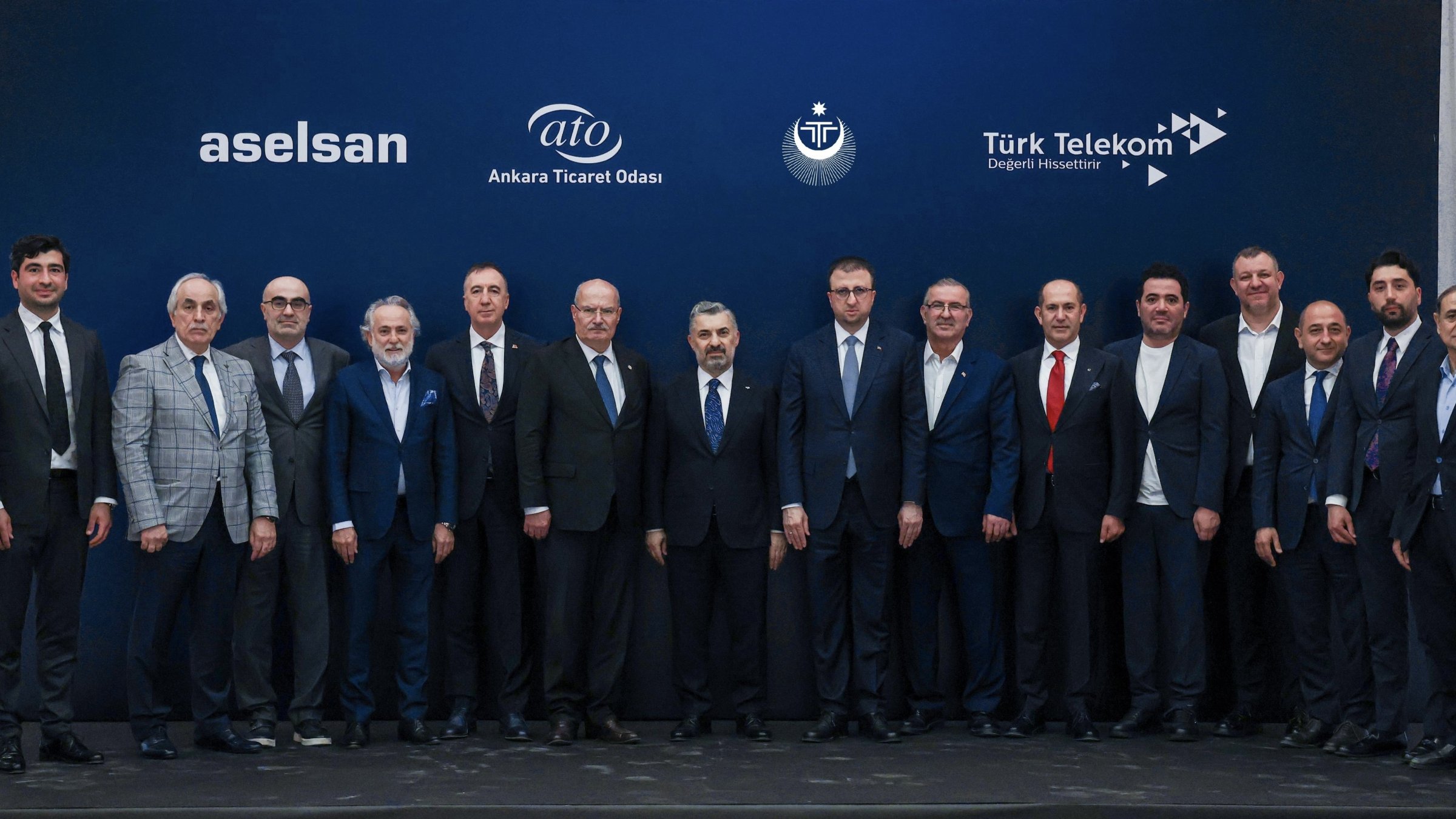 Türk Telekom CEO Ebubekir Şahin (8th L), Aselsan CEO Ahmet Akyol (9th R) and other officials attend a launch event, Istanbul, Türkiye, May 18, 2026. (IHA Photo)