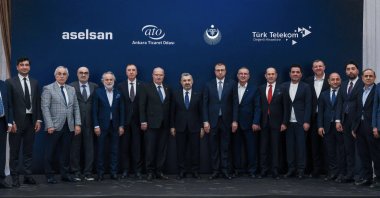 Türk Telekom CEO Ebubekir Şahin (8th L), Aselsan CEO Ahmet Akyol (9th R) and other officials attend a launch event, Istanbul, Türkiye, May 18, 2026. (IHA Photo)