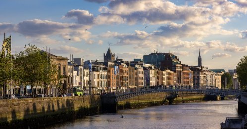 Pedestrians cross the Ha'penny Bridge over the River Liffey, Dublin, Ireland, June 8, 2024. (Shutterstock Photo)