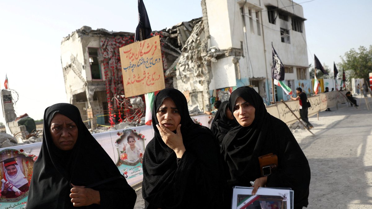Raheleh, an Iranian woman who lost two of her children in Minab school strike during U.S.-Israeli bombing on Feb. 28, reacts at Minab school in Minab, Iran, May 21, 2026. (Reuters Photo)