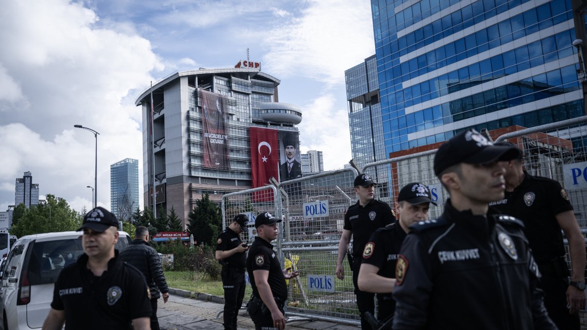 Police officers wait outside the CHP headquarters, Ankara, Türkiye, May 24, 2026. (AA Photo)
