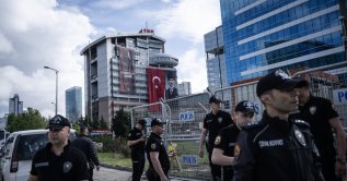 Police officers wait outside the CHP headquarters, Ankara, Türkiye, May 24, 2026. (AA Photo)
